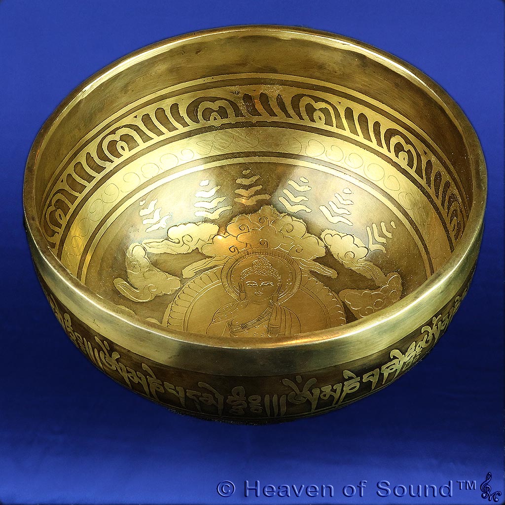 Certified singing bowl with healing vibration of OM & intricate engravings of Buddha and Tibetan script, only available at Heaven of Sound