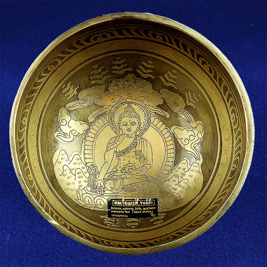Dark etched + carved, certified singing bowl with healing vibration of OM , only available at Heaven of Sound