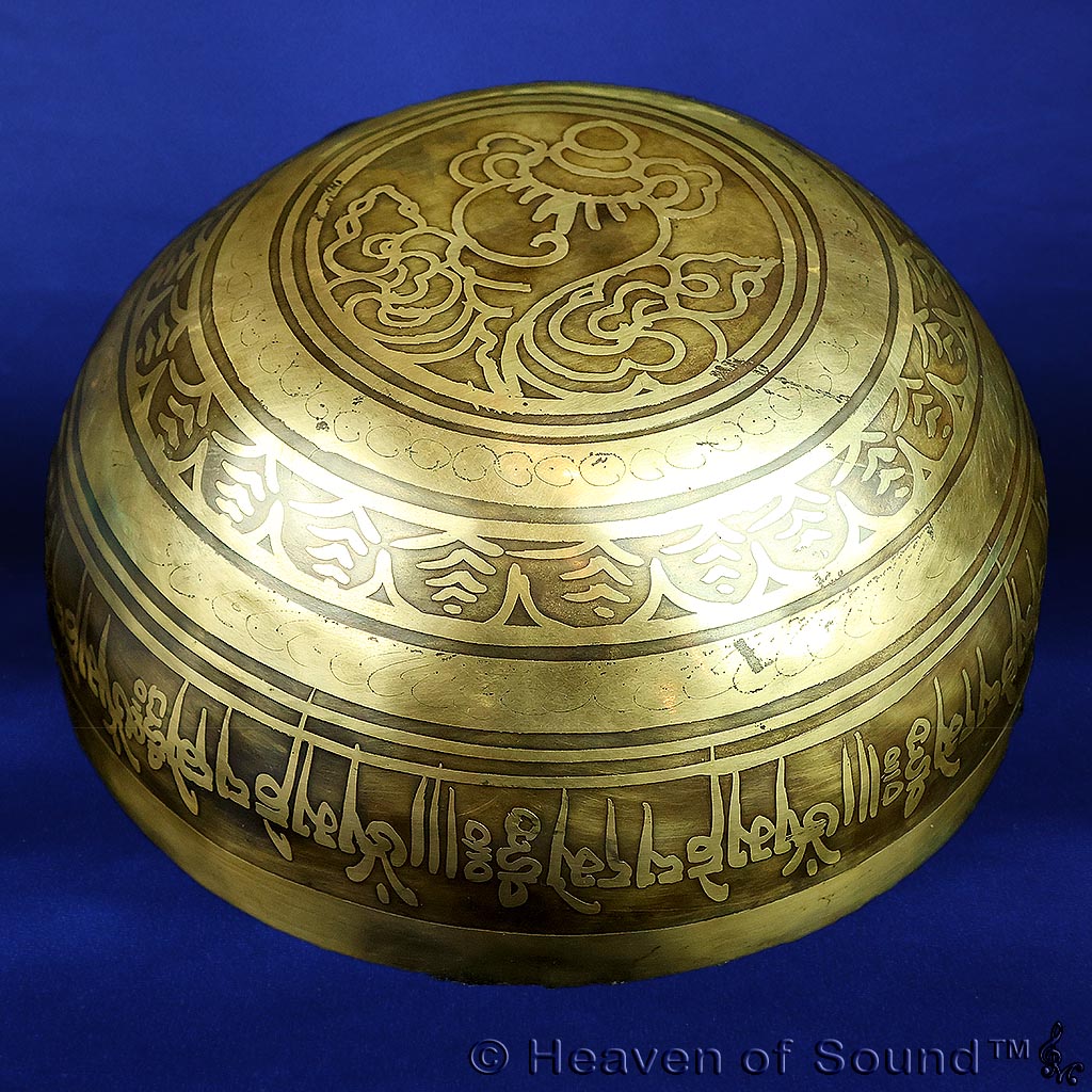 Certified Tibetan singing bowl with healing vibration of OM & intricate engravings of Buddha and Tibetan script, exclusively available at Heaven of Sound